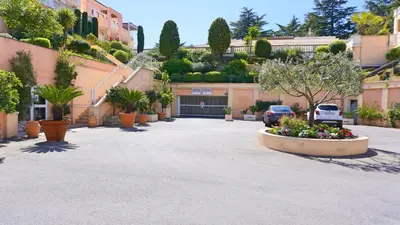 a parking lot in front of a building at Cannes Passion in Cannes