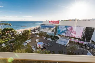 an aerial view of a beach and a building at Luxury Croisette Sea view facing Palais in Cannes