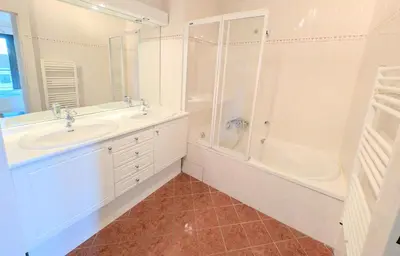 a bathroom with a sink and a shower and a tub at Ref FLORIAN by Palmes dProperties in Cannes