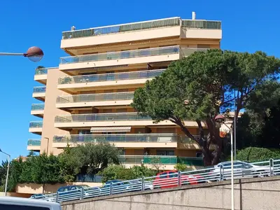 a group of buildings on a city street at Studio F1 avec jardin, proche du Palais des festivals et des plages in Cannes