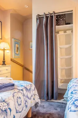 a bedroom with a bed and a shower at Apartment Cannes Felibriges in Cannes