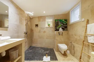 a bathroom with a toilet and a sink at Immogroom - Maisonnette - T3 - A/C - Wifi in Cannes