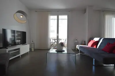 a living room with a couch and a tv at 
