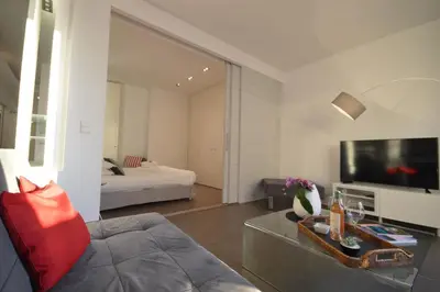 a living room with a couch and a television at 