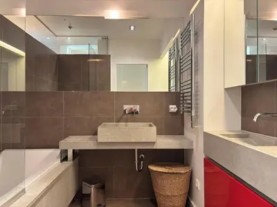 a bathroom with a sink and a tub at 