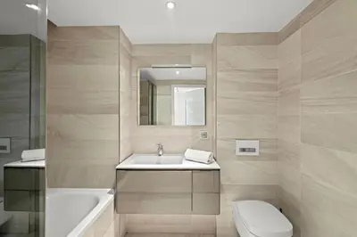 a bathroom with a sink and a tub and a toilet at Cannes Croisette 2 bedrooms - 7C3 in Cannes