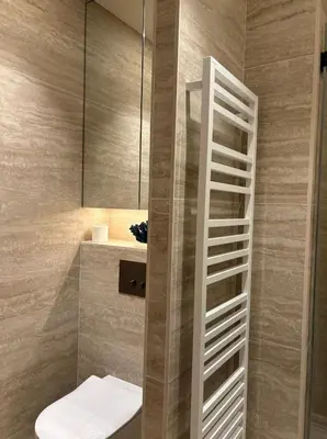 a bathroom with a toilet and a mirror at Cannes 1 bedroom apartment - M1 in Cannes