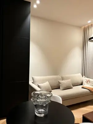 a living room with a couch and a table at Cannes 1 bedroom apartment - M1 in Cannes