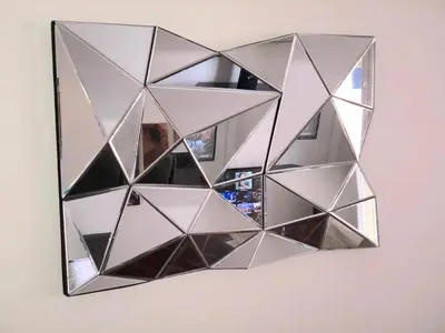 a mirror hanging on a wall at Luxury Studio YourHostHelper in Cannes