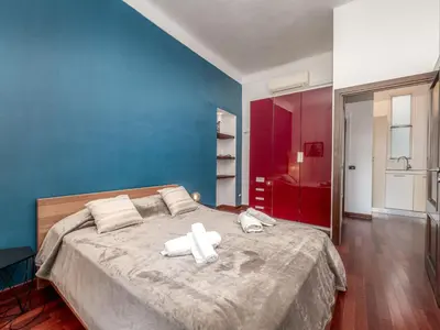 a bedroom with a large bed with two towels on it at Apartment rue des Serbes by Interhome in Cannes
