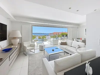 a bathroom with a shower and a toilet and a sink at Penthouse 2-Bedroom apartment with 360º views and parking in Cannes