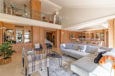 a living room with a couch and chairs at REF 823 - Cannes Center - Duplex apartment for rent in Cannes