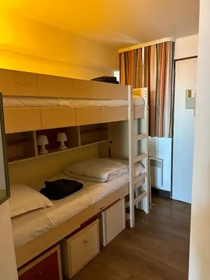 a bunk bed room with two bunk beds at Sisley 068 - F2 et magnifique vue mer in Cannes