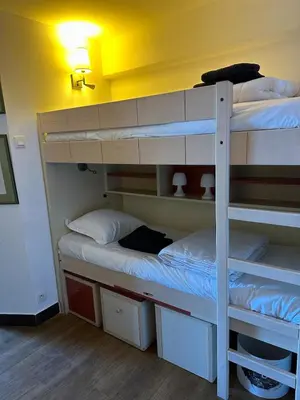 a room with two bunk beds in a room at Sisley 068 - F2 et magnifique vue mer in Cannes