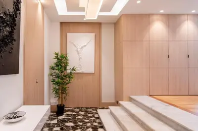 a room with stairs and a plant on the wall at REF 1985 - Cannes - Duplex for rent in Cannes