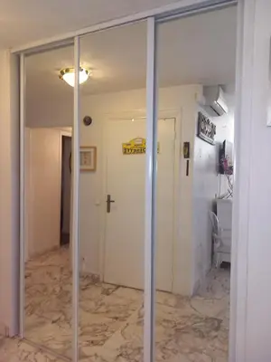 a glass door with a sign on it in a room at Jo Malone in Cannes