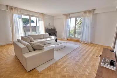 a dining room with a table and chairs at Luxury Cannes Film Festival Townhouse 3 Bedrooms Private Pool & Terrace in Cannes