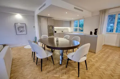 a kitchen with a island with a cat statue on it at Luxury Cannes Film Festival Townhouse 3 Bedrooms Private Pool & Terrace in Cannes