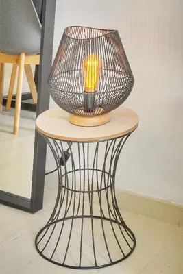 a table with a lamp on top of it at Charmant duplex proche de Cannes centre et à 2min à pied de la mer in Cannes