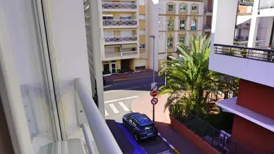 a car parked on a city street from a window at Proche Carlton & Croisette, Appartement 202 - Palmazur Vacances in Cannes