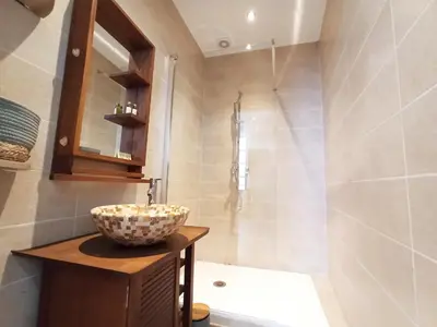 a bathroom with a sink and a shower and a bowl at Viva Riviera 6 Rue Commandant André in Cannes