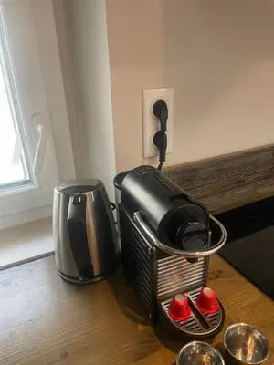 a toaster and coffee maker sitting on a table at Cannes historic center in Cannes