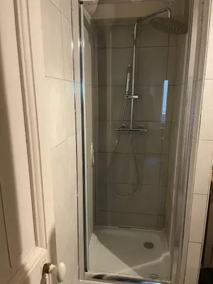 a shower with a glass door in a bathroom at Cannes historic center in Cannes