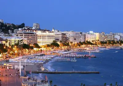 a view of a city with a beach and buildings at Studette Cannes Croisette Martinez Area in Cannes