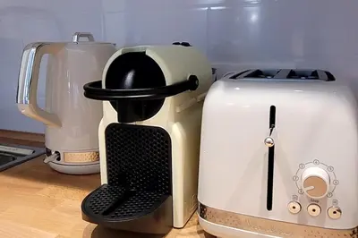a coffee maker and a toaster on a counter at Cozy studio in the heart of Cannes in Cannes