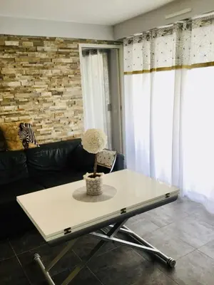 a white coffee table in a living room at Elegant F2 with all comforts in center of Cannes in Cannes