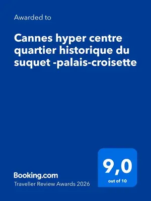 a hallway with a white door and wooden floors at Cannes hyper centre quartier historique du suquet -palais-croisette in Cannes