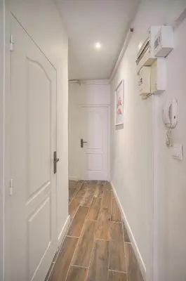 a bathroom with a white toilet in a room at Cannes hyper centre quartier historique du suquet -palais-croisette in Cannes