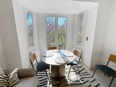 a small bedroom with a bed and a window at Lovely 1 bedroom rue Pasteur near the Croisette 246 in Cannes