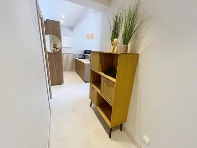 a small kitchen with a counter and a microwave at Lovely 1 bedroom rue Pasteur near the Croisette 246 in Cannes