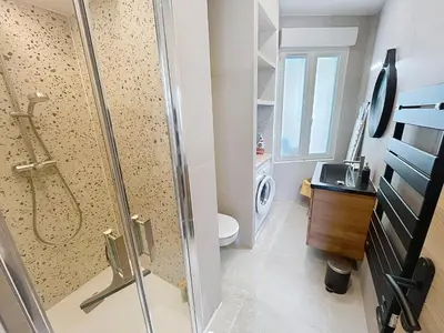 a kitchen with wooden counters and a red appliance at Lovely 1 bedroom rue Pasteur near the Croisette 246 in Cannes