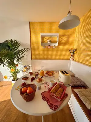 a table with food on it in a kitchen at Vue mer imprenable, piscine à débordement - Cannes in Cannes
