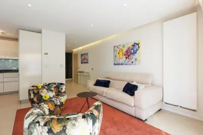 a living room with a couch and two chairs at Immogroom Luxury 1 bedAppartment AC Terrace in Cannes