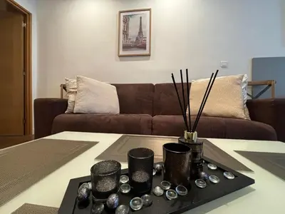 a living room with a couch and a coffee table at Verginia in Cannes