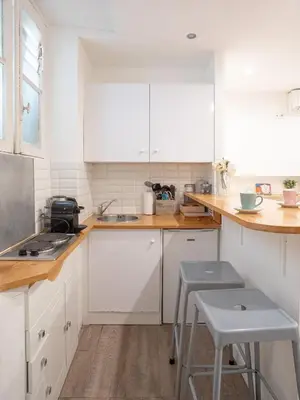 a bedroom with a bed in a room at Sublime Appartement 5 Mins à Pied Du Palais Des Festivals by Halldis in Cannes