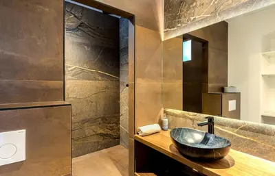 a bathroom with a bowl sink on a counter at Le Lac Studio Moderne Proche Suquet - climatisation Wifi - LIMESTAY in Cannes