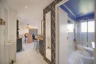 a bathroom with a shower and a sink and a toilet at Isa - Clim - WiFi - Balcon - VCA in Le Cannet