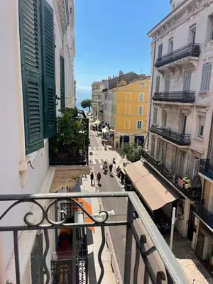 a view of a city street from a balcony at Ref PINSON in Cannes