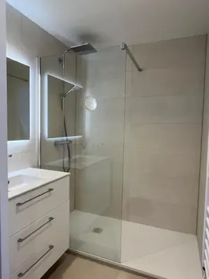 a white bathroom with a shower and a sink at Celeste Cannes Centre 700m du Palais des Festivals in Cannes