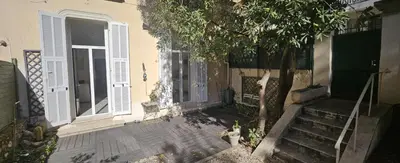 an outside view of a house with a fire hydrant at F3 ground floor, Hypercentre 2 min from Palace in Cannes