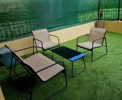 three chairs and a table and two chairs at Studio with a 20sqm terrace 10min from la Croisette in Cannes
