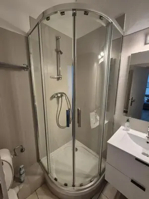 a bathroom with a shower and a sink at Cannes centre - Vieux port in Cannes