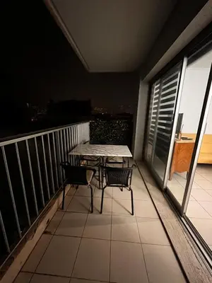 a balcony with a table and chairs on a balcony at Large Studio in Cannes near la Croisette and beach in Cannes