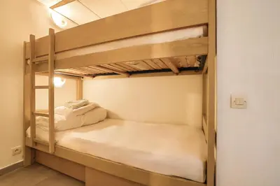 a couple of bunk beds in a room at LX122 Terrasse, piscine & plage à pied - Cannes in Cannes