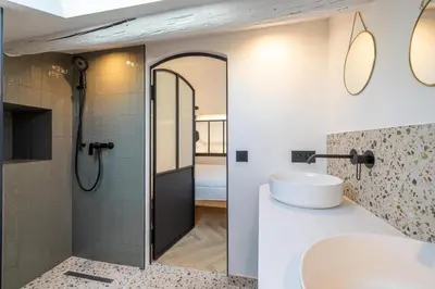a bathroom with a sink and a shower at REF 1993 - Cannes Center Renovated Apartment in Cannes