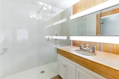 a bathroom with a sink and a shower at Luxurious Apartment with Sea and Carlton View in Cannes